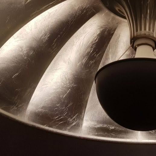 Venetia-Stvdivm-Silver-Leaf-3 Close-up of brushed silver lamp interior with light