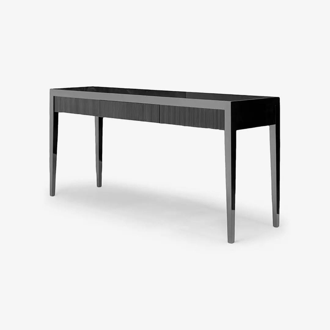 Modern black console table with tapered legs
