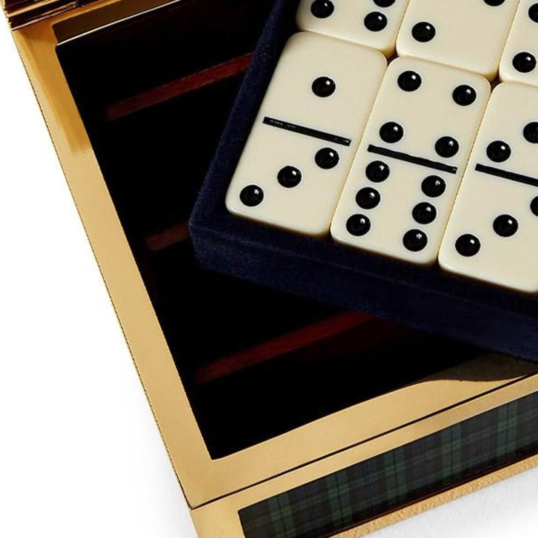 Close-up of dominoes in elegant wooden box