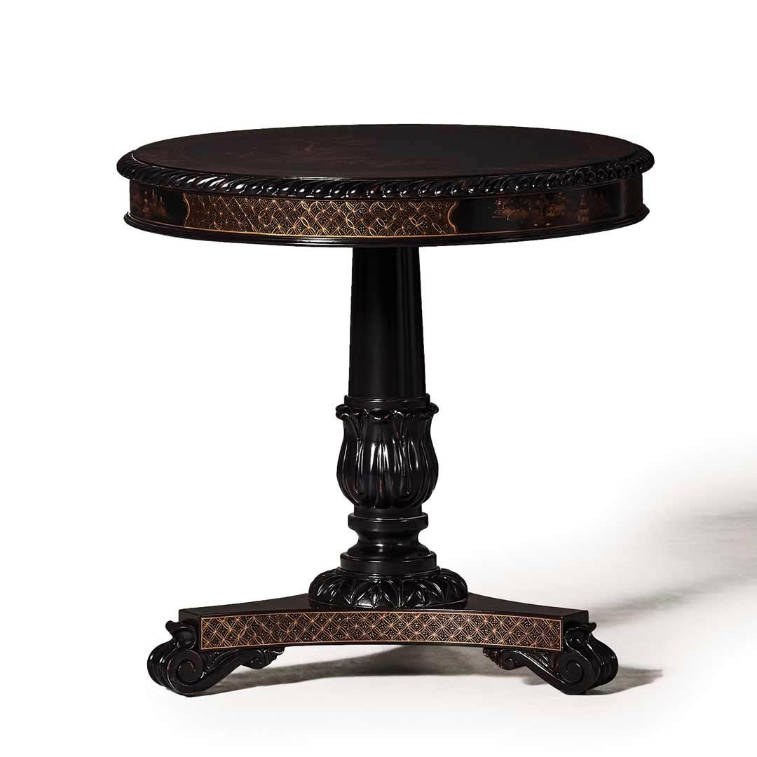 Antique carved wooden table with intricate inlays