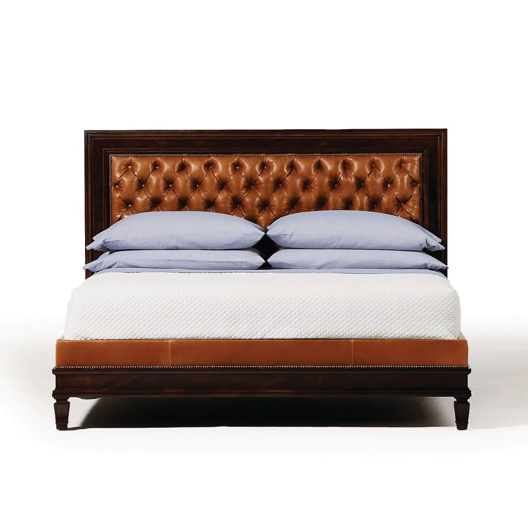 Elegant leather headboard bed with blue bedding