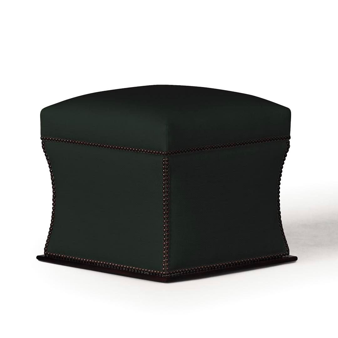 Green upholstered ottoman with decorative nailhead trim