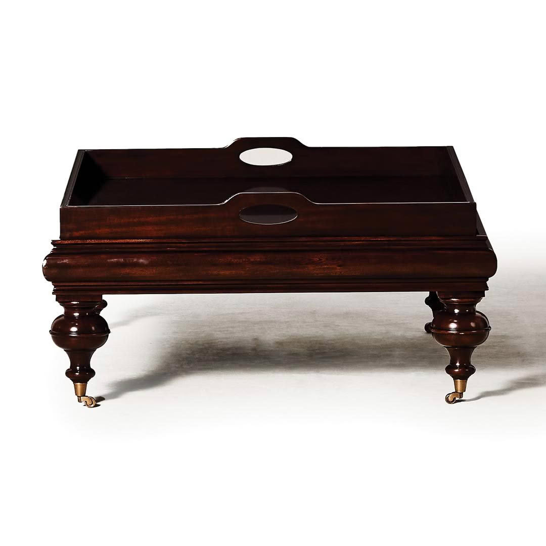 Antique wooden serving tray on elegant carved legs