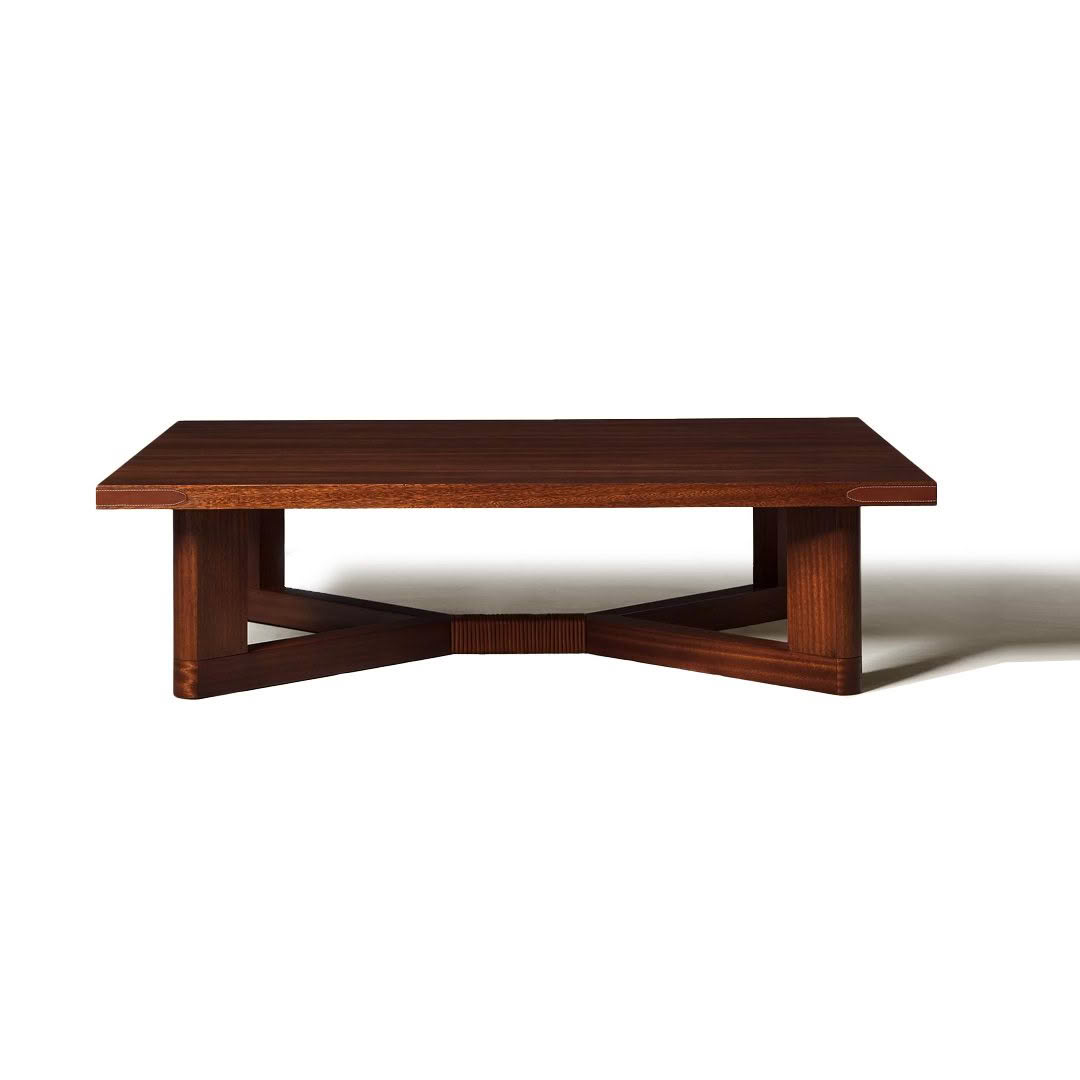 Elegant wooden coffee table with crossed legs design