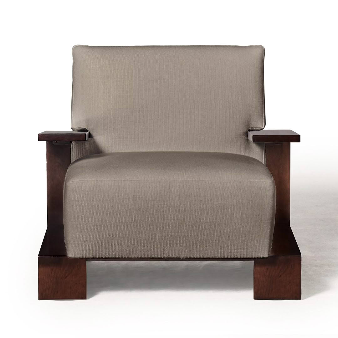 Modern beige armchair with dark wooden frame