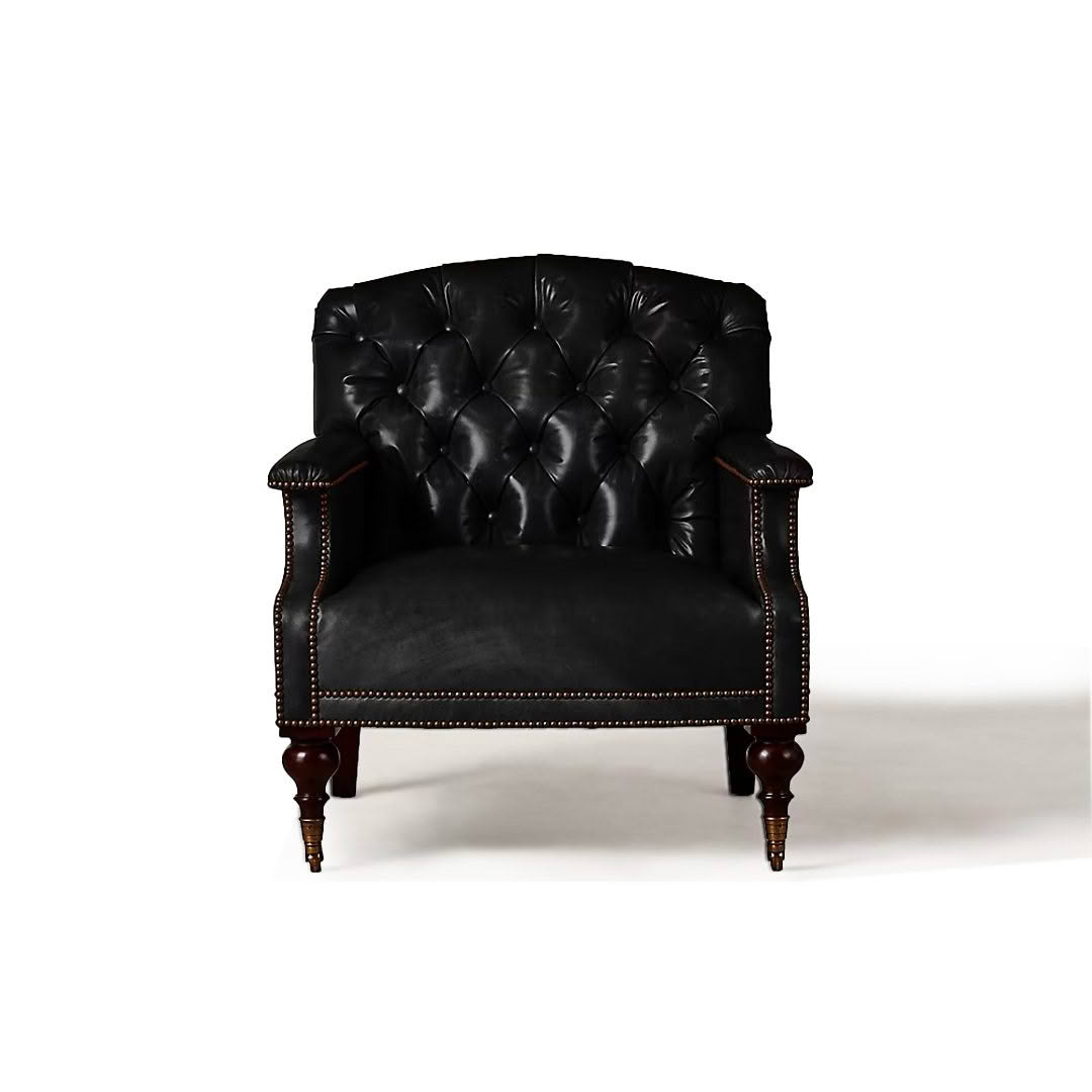 Elegant black leather tufted armchair on white background