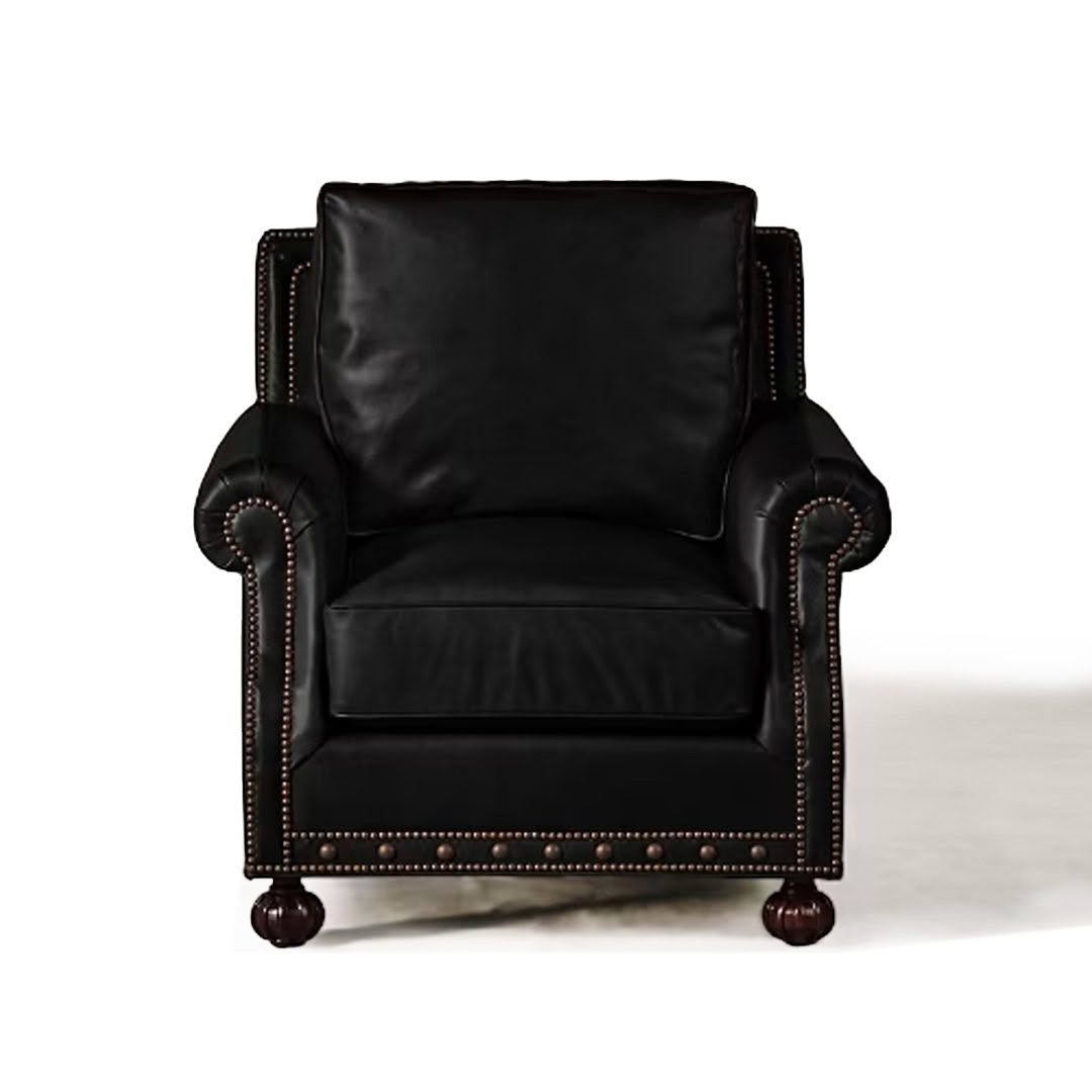 Elegant black leather armchair with nailhead trim