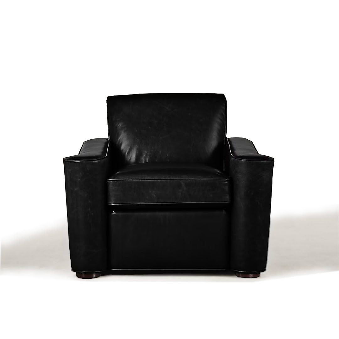 Black leather armchair on white background