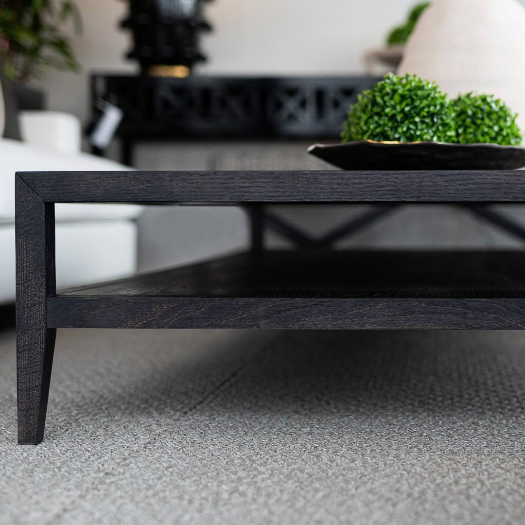 Elegant dark wooden coffee table in stylish living room