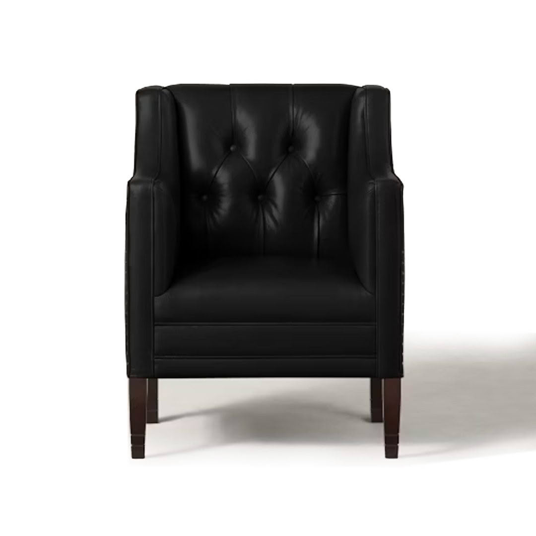 Elegant black leather tufted armchair on white background