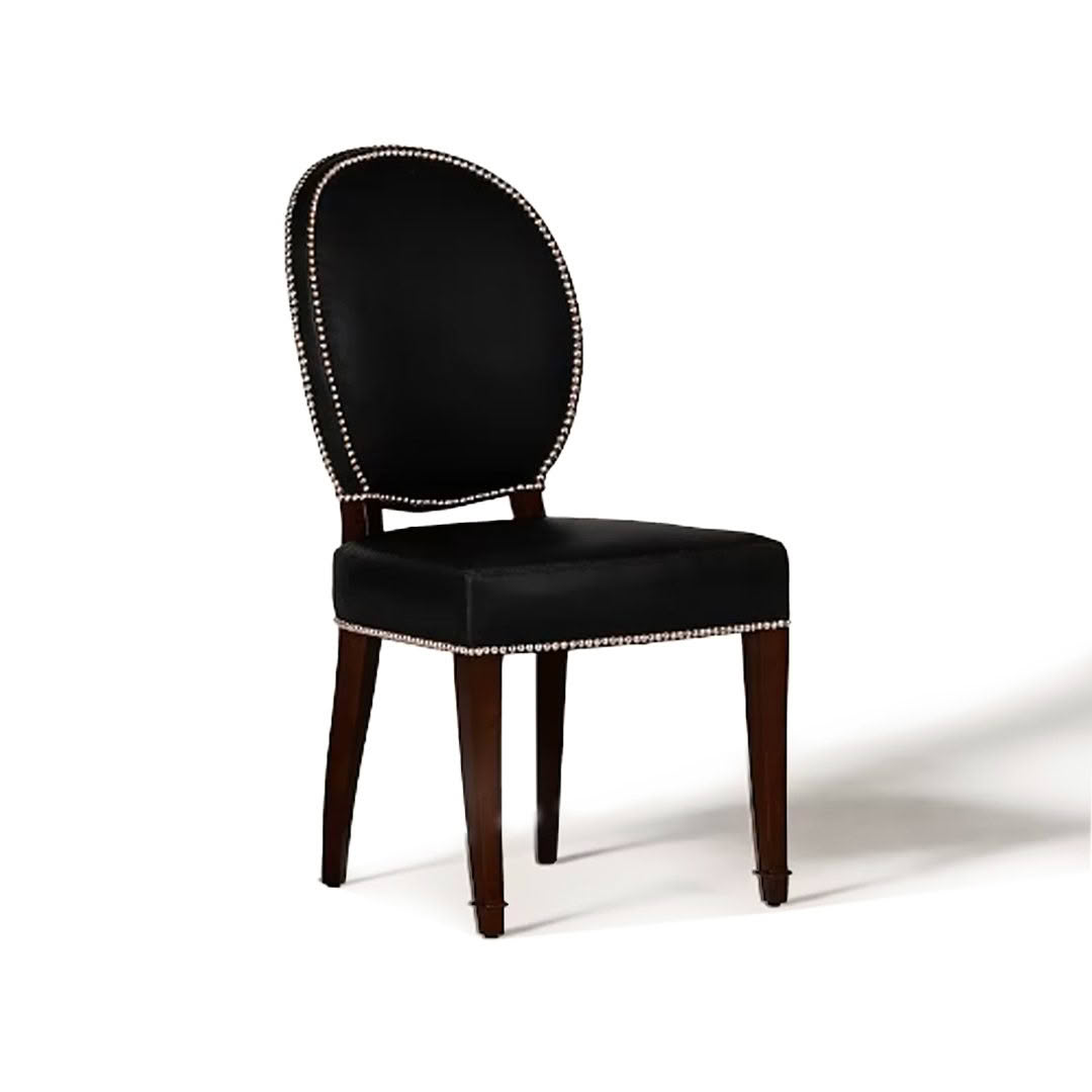 Elegant black upholstered chair with nailhead trim
