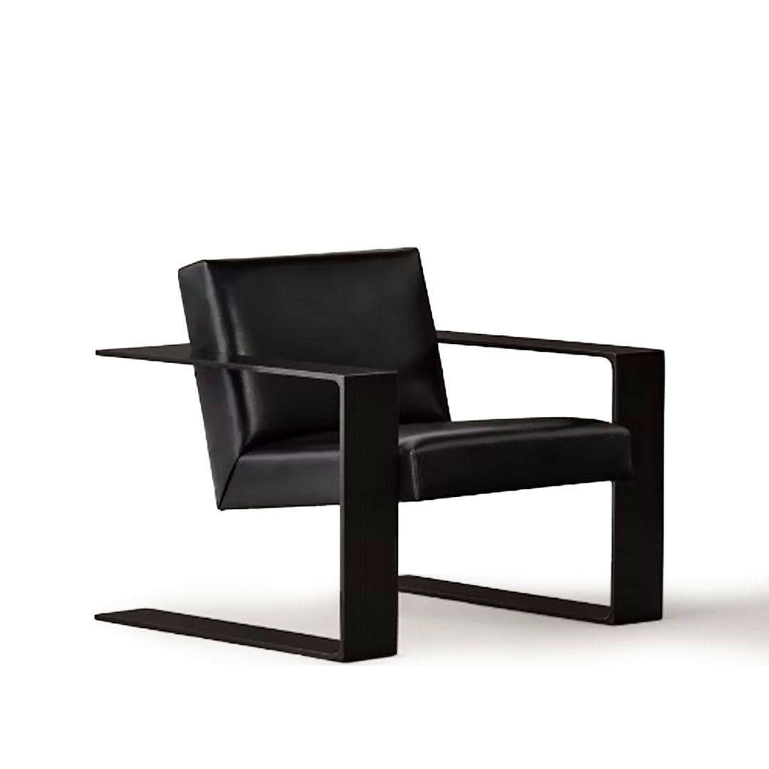 Modern black leather armchair on white background