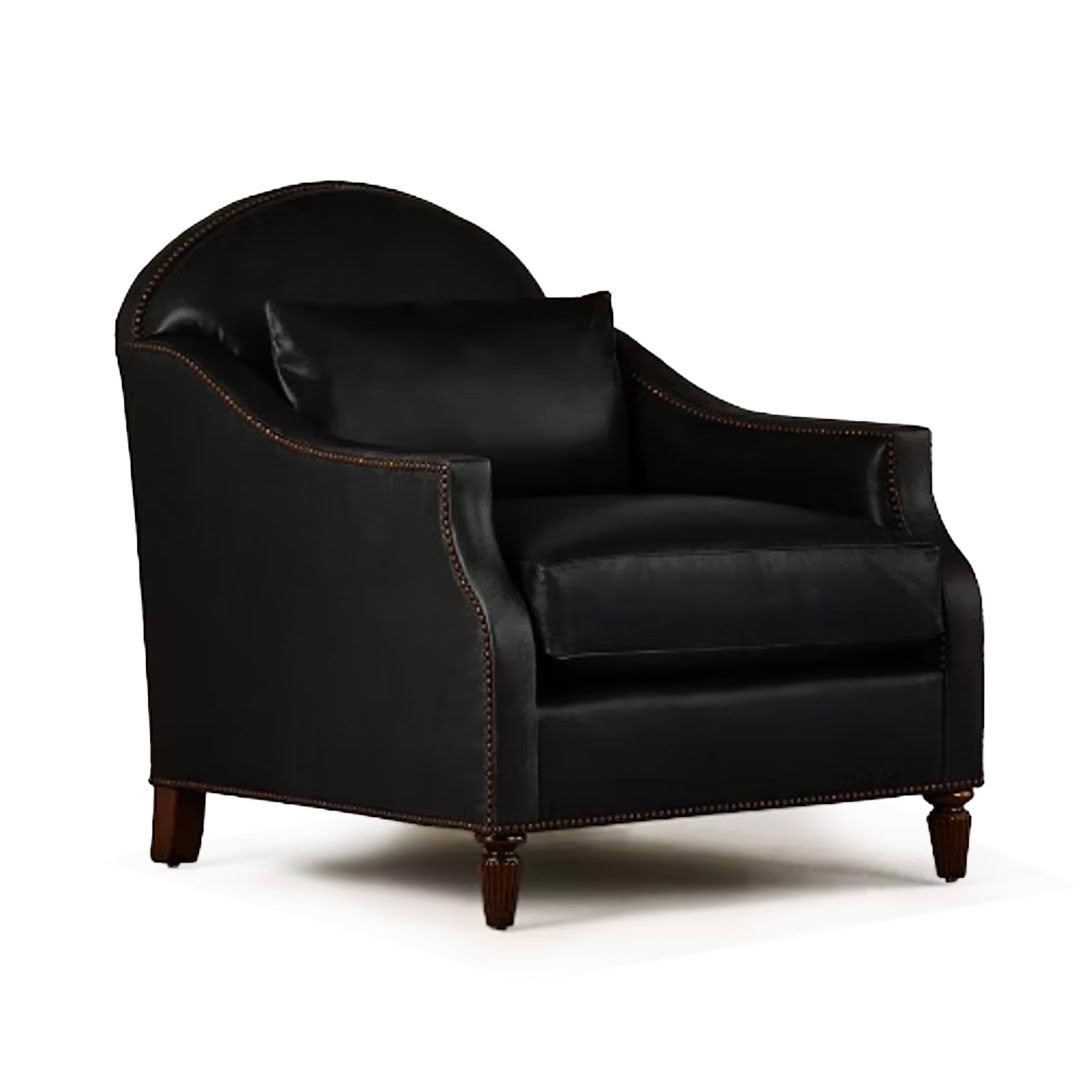 Elegant black leather armchair with wooden legs