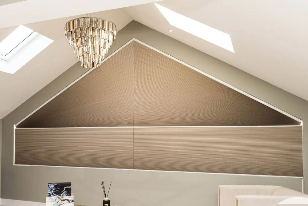 Modern attic room with elegant crystal chandelier