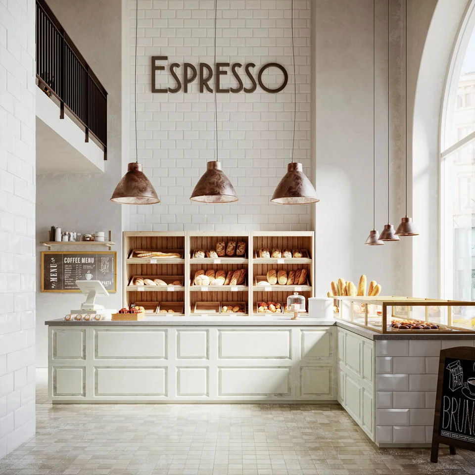Bright bakery interior with espresso sign and bread shelves