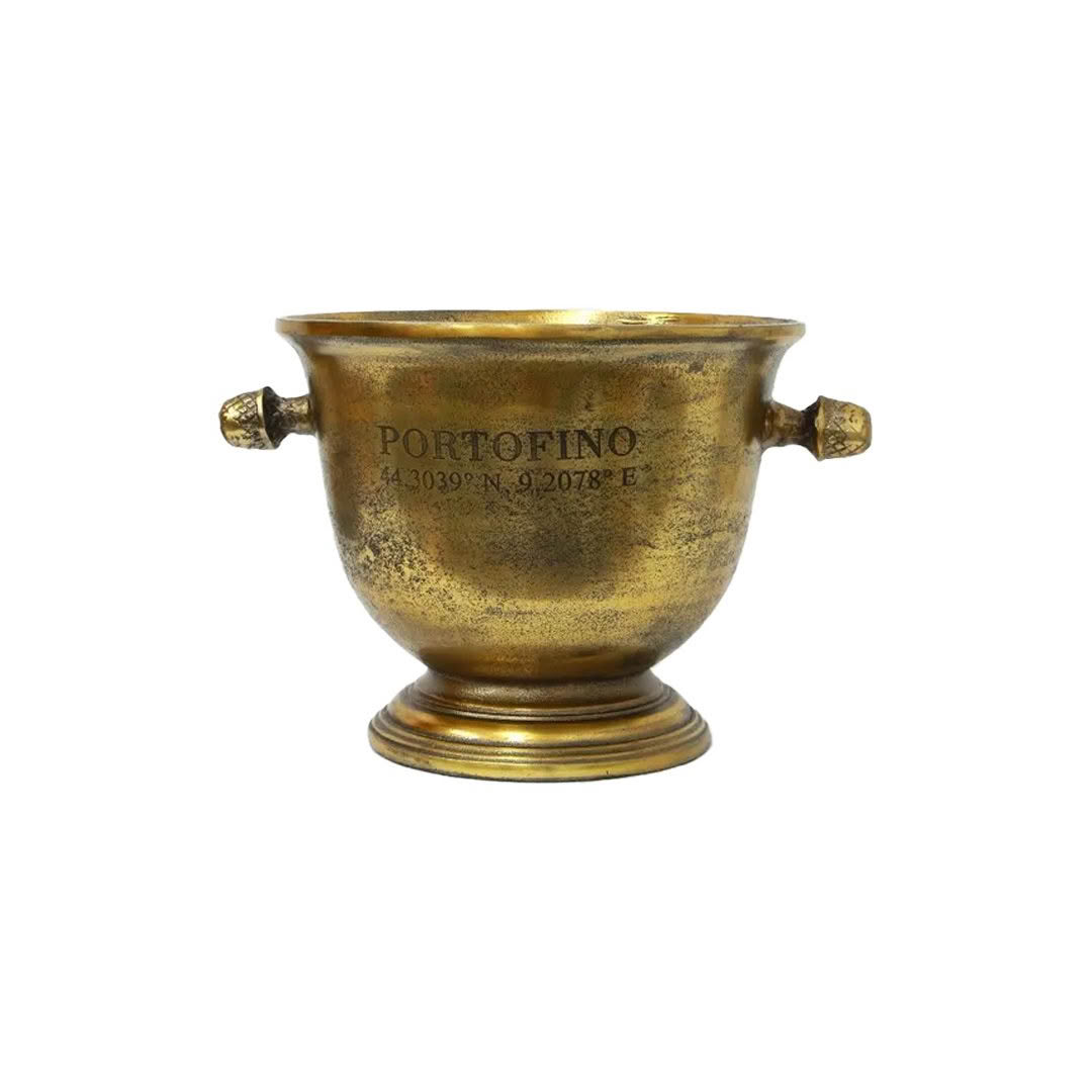 Antique brass urn labeled Portofino with coordinates