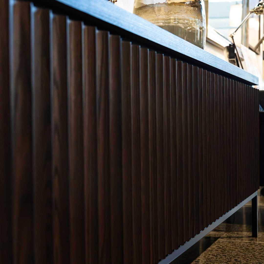 Dark wood bar counter in modern cafe